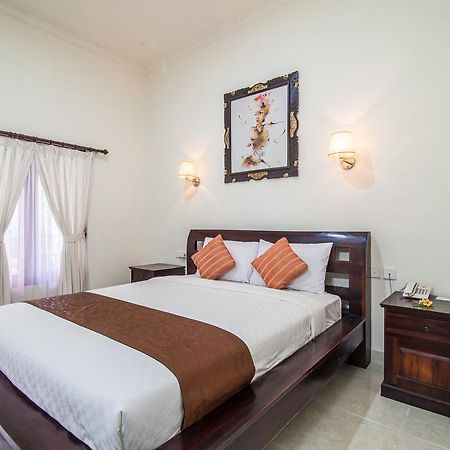 Puri Yuma Hotel Denpasar Extérieur photo