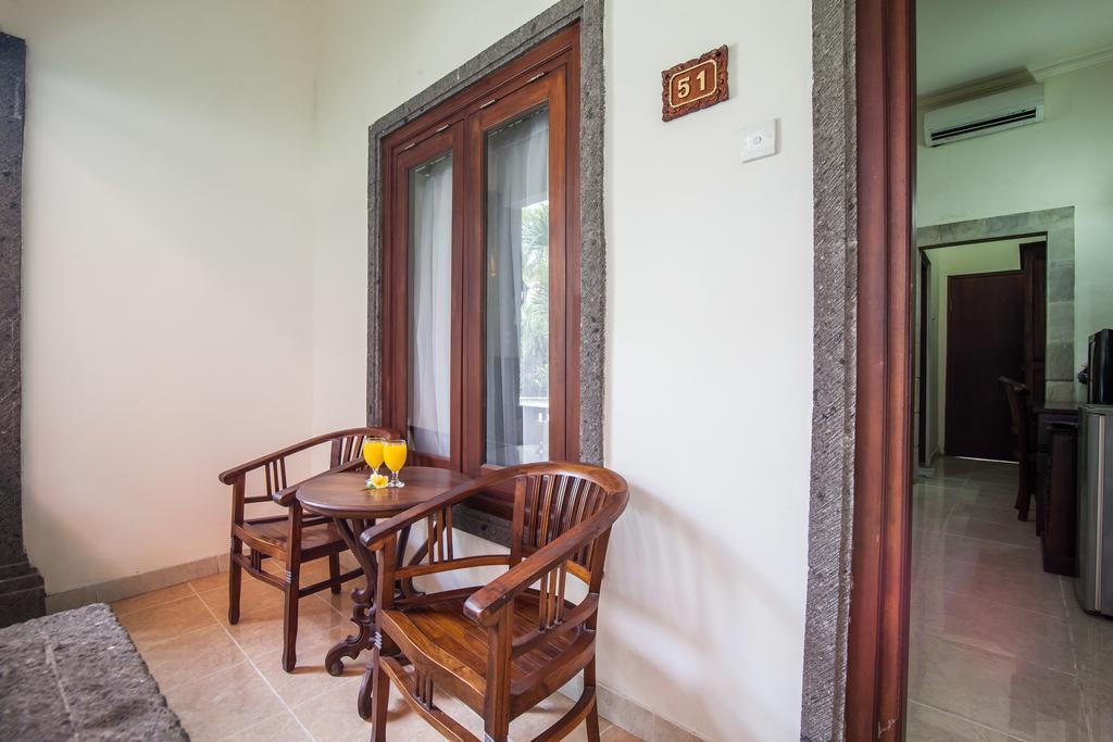 Puri Yuma Hotel Denpasar Extérieur photo