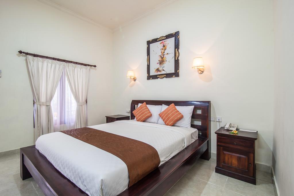 Puri Yuma Hotel Denpasar Extérieur photo