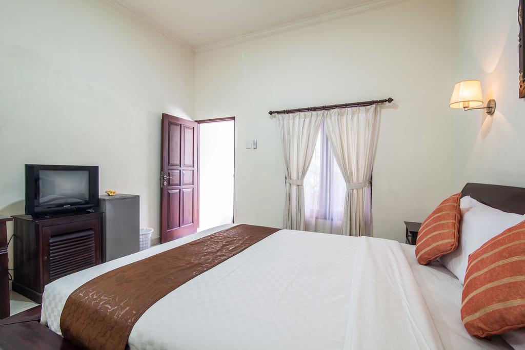 Puri Yuma Hotel Denpasar Extérieur photo