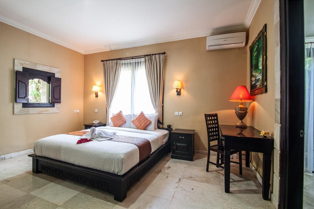 Puri Yuma Hotel Denpasar Extérieur photo