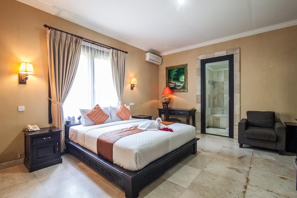 Puri Yuma Hotel Denpasar Extérieur photo