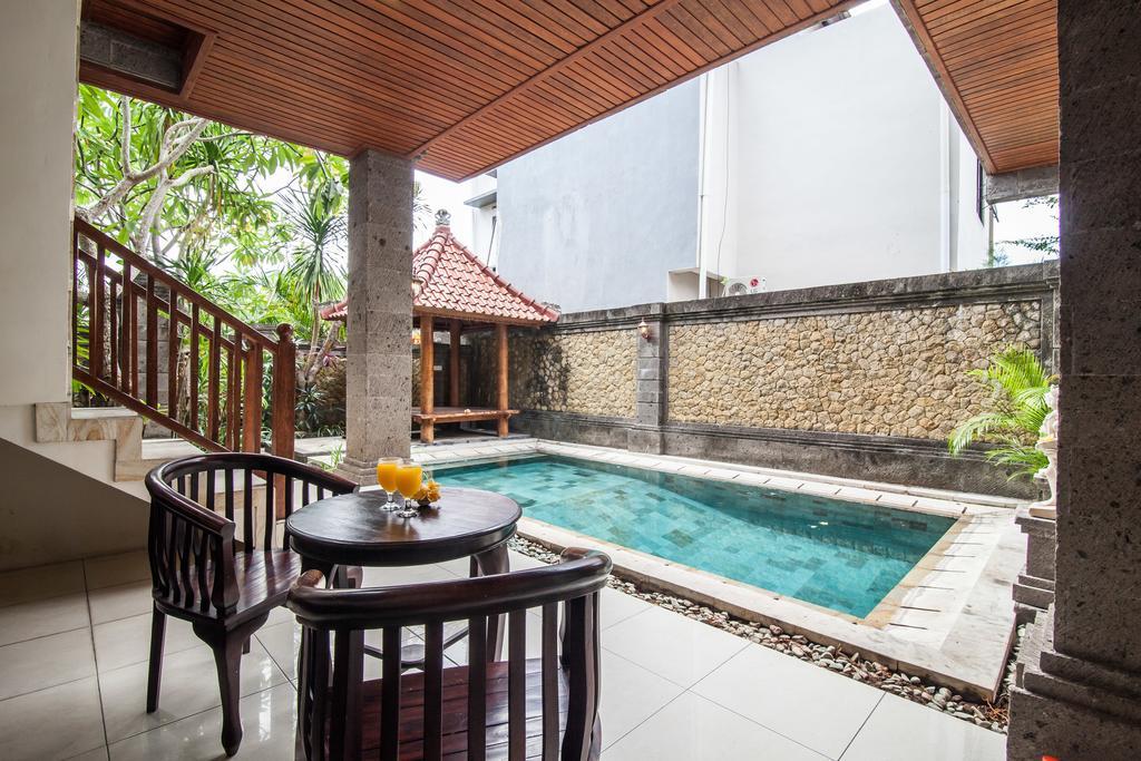 Puri Yuma Hotel Denpasar Extérieur photo