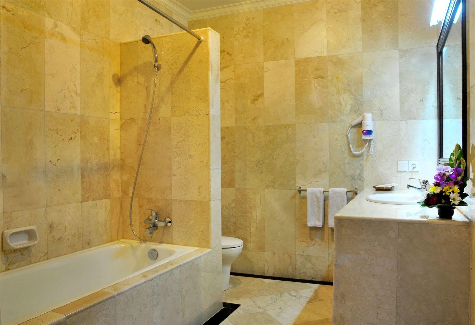 Puri Yuma Hotel Denpasar Extérieur photo