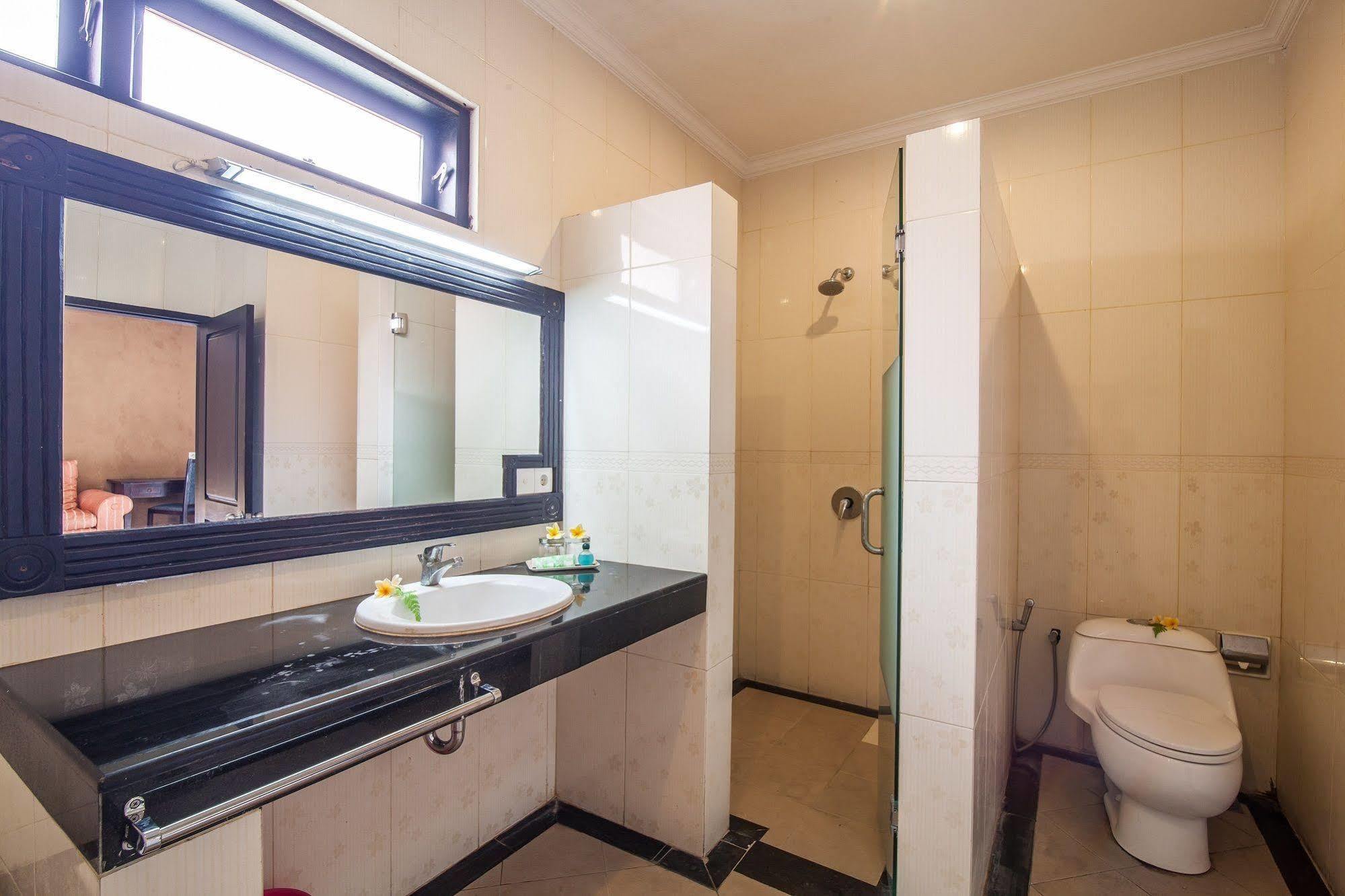 Puri Yuma Hotel Denpasar Extérieur photo