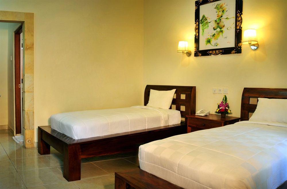 Puri Yuma Hotel Denpasar Extérieur photo