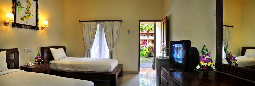 Puri Yuma Hotel Denpasar Extérieur photo